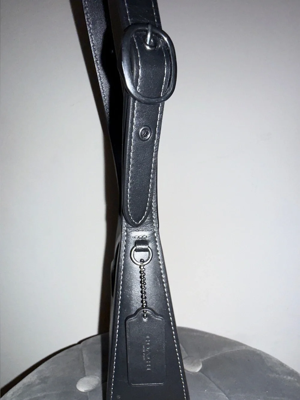 Coach “Eliza” Black Leather Shoulder Bag with Tab Closure